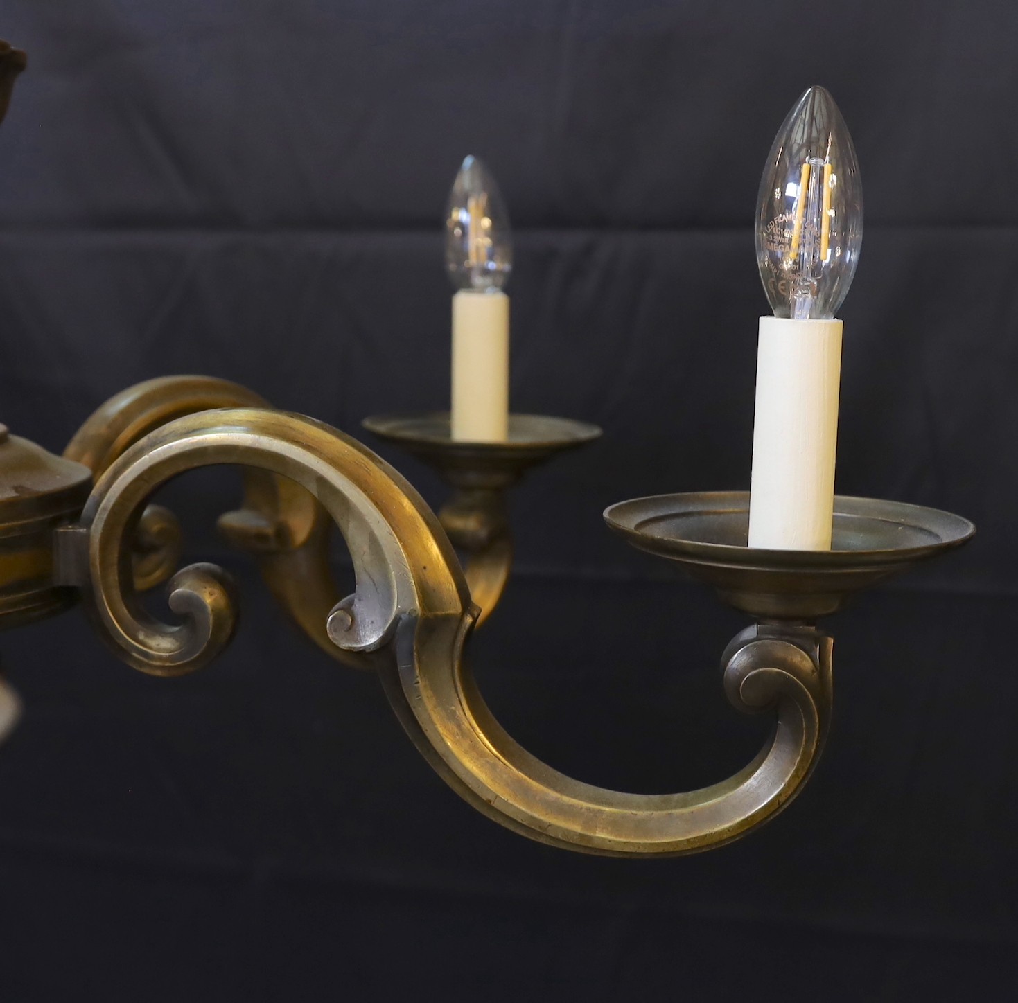 A 1920s-30s French bronze six light chandelier, height including rose 80cm. width 82cm